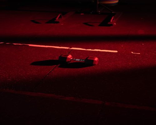 Dark dramatic lighting on high-end gym equipment